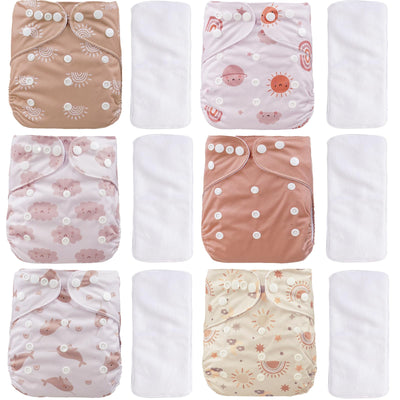 Set of baby cloth diapers with various patterns on a white background