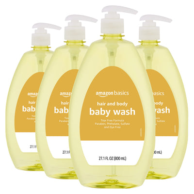 Four bottles of Amazon Basics baby wash on a white background