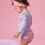 RuffleButts Baby Girls UPF 50+ Sun Protection Floral Printed Long Sleeve One Piece Rash Guard Swimsuit with Zipper - Lavender Floral Princess, 3-6 Months