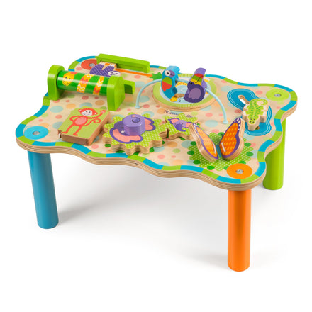 Colorful children's activity table with various educational toys on a white background