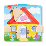 Children's wooden puzzle shaped like a house with colorful roof and door, featuring characters from 'Blue's Clues'.