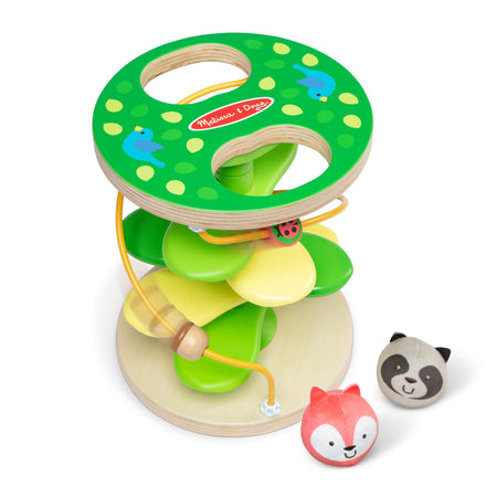 Wooden toy with colorful rings and small animal figures on a white background