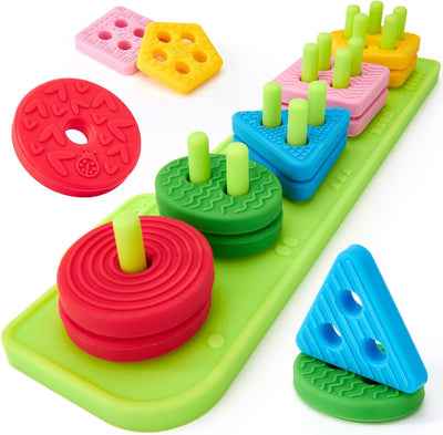 Colorful children's educational toy with various shapes and textures on a white background