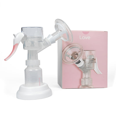 Manual breast pump with a pink 'Love' branded box on a white background