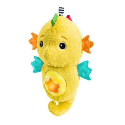 Yellow plush toy resembling a seahorse on a white background