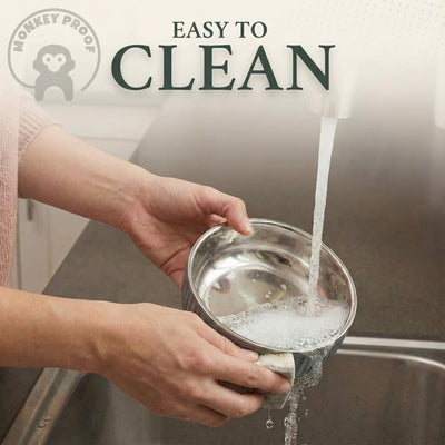 Person washing a metal bowl with water, labeled 'Easy to Clean' by Monkey Proof.