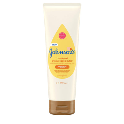 Johnson's Creamy Oil tube with yellow label on a white background