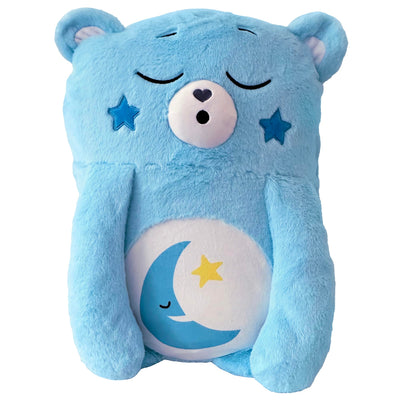 Blue plush bear with star and moon design on a white background