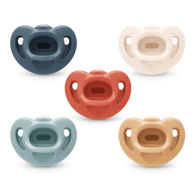 Five colorful baby pacifiers on a white background