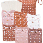 Set of baby swaddle blankets with various patterns on a white background