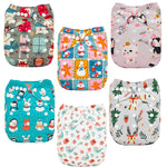 Set of colorful patterned cloth diapers on a white background