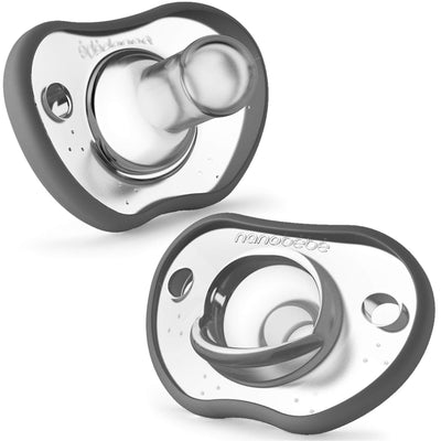 Two gray pacifiers with 'nanobebé' branding on a white background