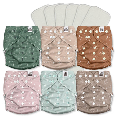 Set of six patterned cloth diapers on a white background