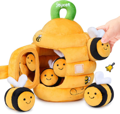 Plush toy bee hive with bee characters on a white background