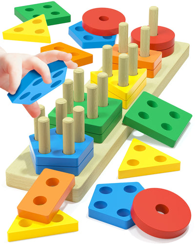 Colorful geometric shape sorting toy with wooden blocks and a hand placing a blue block.