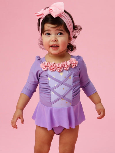 RuffleButts Baby Girls UPF50+ Princess Dress-Up Long Sleeve One Piece Swimsuit - Amethyst Princess, 12-18 Months