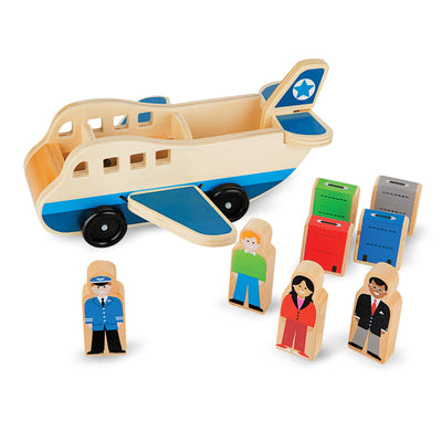Wooden toy airplane with passengers on a white background