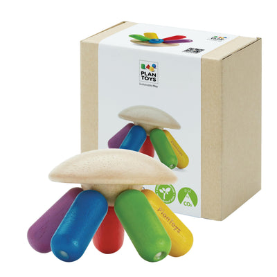 Colorful wooden toy with a Plan Toys branded box on a white background