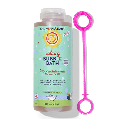 California Baby calming bubble bath bottle with a pink bubble wand on a white background