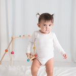 PlanToys Wooden Clutching Triangle Baby Toy with Gentle Sound in Two-Toned Ball (5244) | Sustainably Made from Rubberwood and Non-Toxic Paints and Dyes
