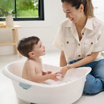 Skip Hop Baby Bath Tub 4-in-1 Grow with Baby Infant to Toddler Bathtub with Supportive Sling and Sit-Up Support Wave Age 0m+