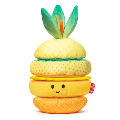 Stackable toy shaped like a pineapple with a smiling face on a white background