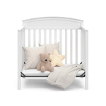 Graco Benton 4-in-1 Convertible Mini Crib with Bonus Crib Mattress – GREENGUARD Gold Certified, 2.75-Inch Mattress Included, Baby Crib Converts to Twin Bed, Ideal for Small Spaces (White)