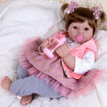 Aori Reborn Baby Dolls 22 Inch - Realistic Baby Doll for Kids 3+ Years - Lifelike Newborn Baby Girl in Panda Outfit - Handmade Cloth Body Doll for Gift, Collection & Role Play