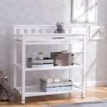 Delta Children Flat Top Changing Table with Wheels and Changing Pad - Greenguard Gold Certified, Bianca White