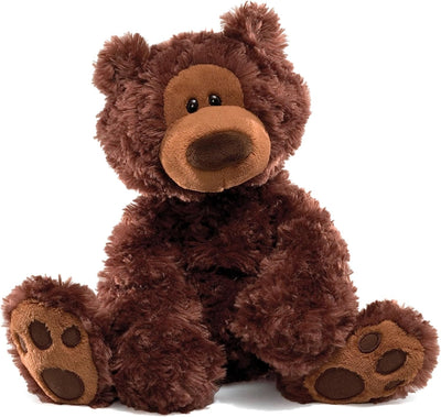 Brown teddy bear on a white background