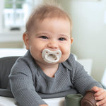 Chicco PhysioForma Luxe Orthodontic Pacifier for Babies 0-6 Months, One-Piece 100% Soft Silicone, Supports Breathing, Textured Shield & Handle, Included Sterilizing Case, BPA Free, 2-Pack, Pearl Grey