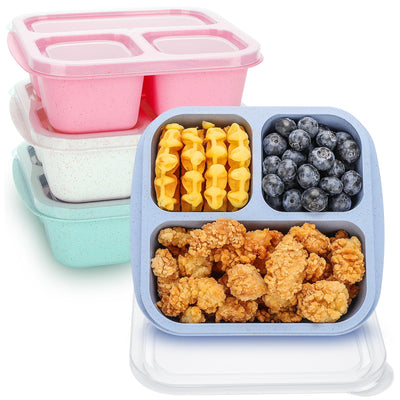 Colorful compartmentalized food containers with snacks on a white background