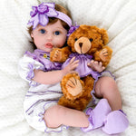 Aori Realistic Reborn Baby Dolls - 22 Inch Lifelike Baby Girl with Feeding Bottle & Pacifier, Weighted Cloth Body for True-to-Life Feel, Gift for Kids Ages 3+