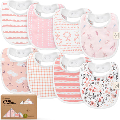 Set of baby bibs with various patterns on a white background