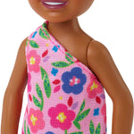 Barbie Chelsea Doll (Brunette Curly Hair) Wearing One-Shoulder Flower-Print Dress and Pink Shoes, Toy for Kids Ages 3 Years Old & Up
