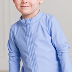 RuffleButts UPF50+ Sun Protective Unisex Long Sleeve Full Zip Rash Guard - Periwinkle Blue, 18-24m