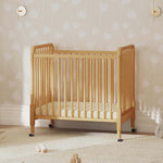 Davinci Jenny Lind 3-in-1 Convertible Mini Crib in Honey, Removable Wheels, Greenguard Gold Certified