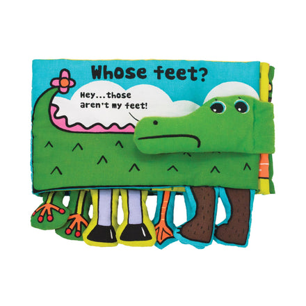 Children's soft book with a green alligator character and text on a white background