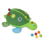 Colorful turtle-shaped toy with small balls on a white background