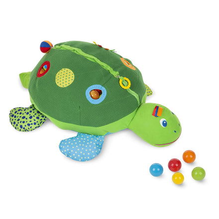 Colorful turtle-shaped toy with small balls on a white background