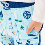 RUGGEDBUTTS Boys UPF50+ Sun Protected Stretch Dolphin Hem Swim Trunks - Blue Sweet Sails, 0-3m