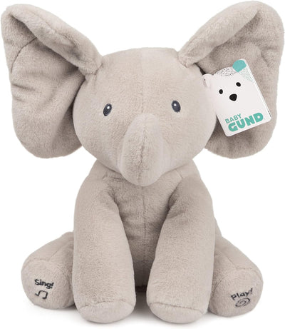 Plush elephant toy with a tag on a white background