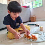 PlanToys® Cargo Train Wooden Montessori Vehicle Toy | Early Movement, Imagination and Practical Life Exploration | Eco Friendly Train Set with Cargo Blocks for Meaningful Play