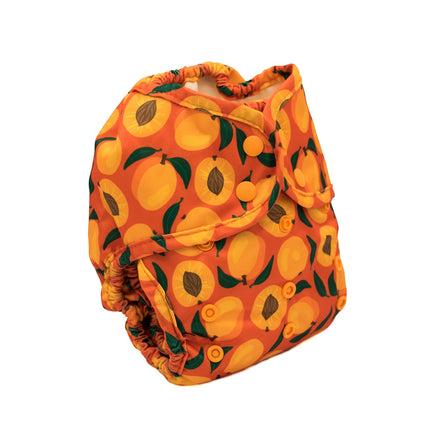 Orange diaper with peach pattern on a white background