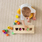 LOVEVERY | The Block Set | Solid Wood Building Blocks and Shapes + Wooden Storage Box, 70 Pieces, 18 Colors, 20+ Activities, Toddler Block Set and Converts into a Pull Car, Ages 12 to 48+ months