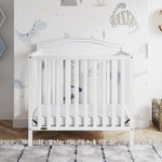 Graco Stella 4-in-1 Convertible Mini Crib with Bonus Mattress – Includes Bonus 2.75 Inch Thick Mattress with Water-Resistant Cover, Converts to Twin Bed, Ideal Crib for Small Spaces (White)