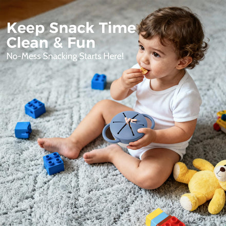 Child eating snacks from a blue snack container on a carpeted floor with toys around