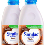 Two bottles of Similac Advance infant formula with blue caps on a white background