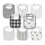 Set of eight baby bibs with various patterns on a white background