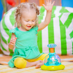 Bright Starts Press & Glow Spinner Cause and Effect Musical Baby Toy, Age 6 Months+